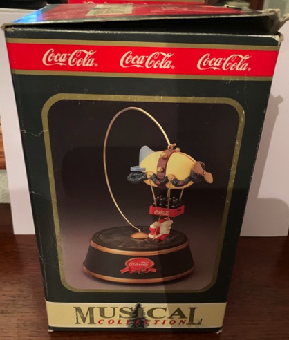 3005-2 € 30,00 coca cola muziekdoos zeppeling geel.jpeg